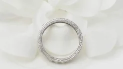 Alliance américaine en platine et diamants 0.80ct