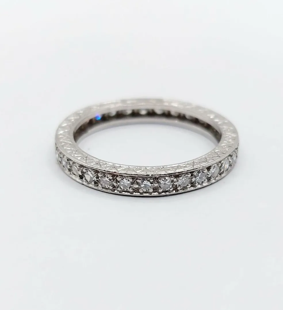 Alliance américaine or blanc 18k et 0,93 carats diamant et monture ciselée