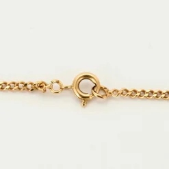 AUGIS - Collier en or jaune retenant une médaille sentimentale