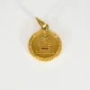AUGIS - Médaille sentimentale en or jaune et rubis.