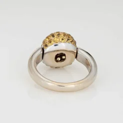 Bague à bascule en or blanc avec tourmaline rose et saphir jaune