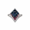 Bague aigrette en or gris diamants, saphirs, rubis