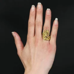 Bague ancienne angelot en or et son diamant