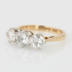 Bague ancienne diamants en jarretière