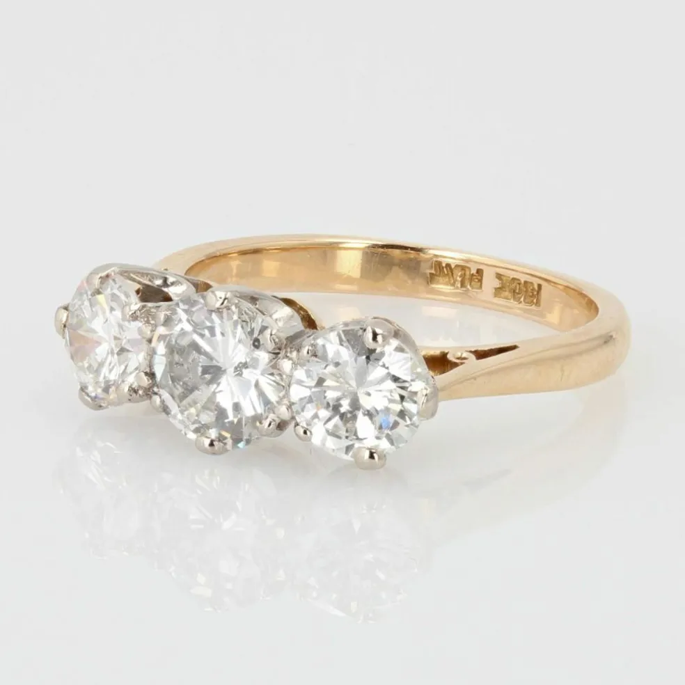 Bague ancienne diamants en jarretière