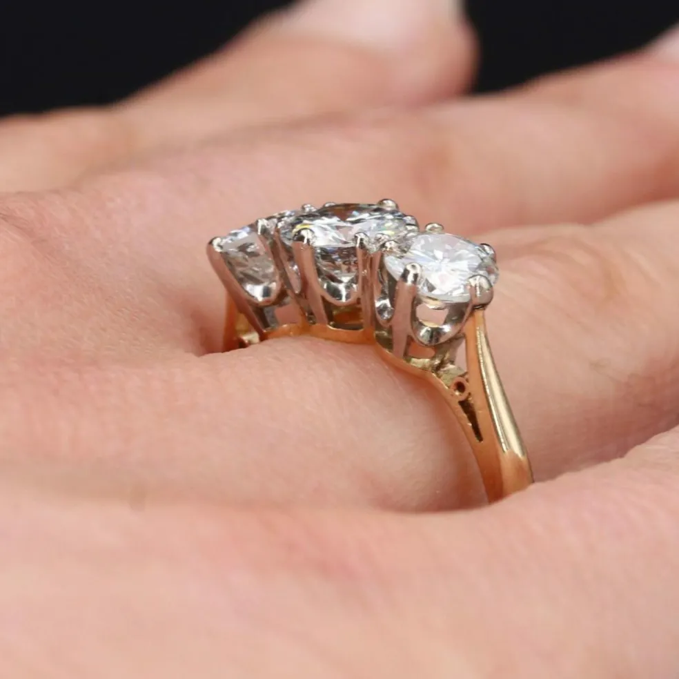 Bague ancienne diamants en jarretière