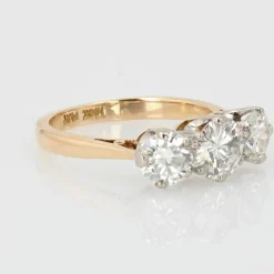 Bague ancienne diamants en jarretière