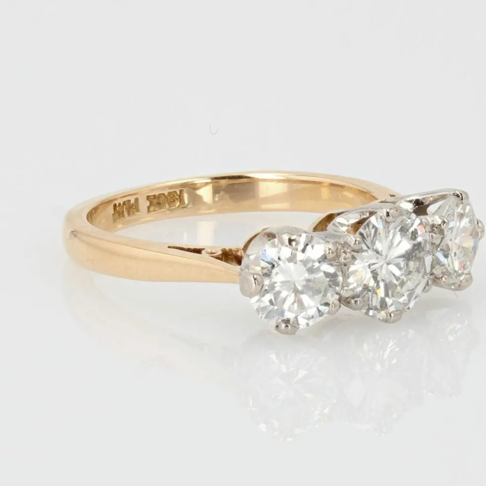 Bague ancienne diamants en jarretière