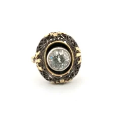 Bague ancienne en or jaune et argent avec diamant