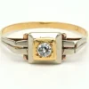 Bague Art Déco en or jaune et blanc 18 carats sertie d'un diamant