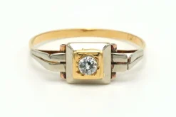 Bague Art Déco en or jaune et blanc 18 carats sertie d'un diamant
