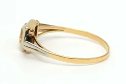 Bague Art Déco en or jaune et blanc 18 carats sertie d'un diamant