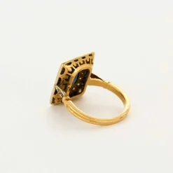Bague Art Déco en or jaune 18K sertie diamants et saphirs