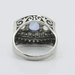 Bague Art Déco saphir Ceylan naturel entourage diamants or gris