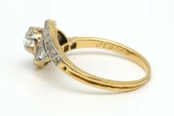 Bague Art Nouveau en or jaune et blanc 18 carats sertie de diamants