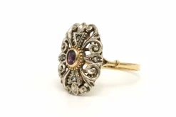 Bague Art Nouveau en or jaune et blanc 14 carats sertie d'un rubis naturel et de diamants