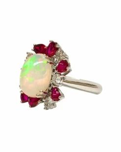 Bague avec Opale entourée de Rubis et Diamants