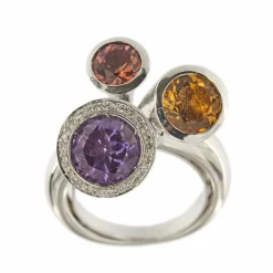 Bague avec pierres précieuses et diamants