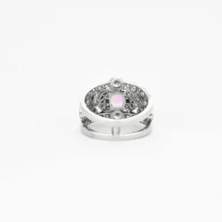Bague bandeau en platine, saphir rose et diamants