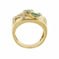 Bague bandeau émeraudes et diamants