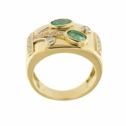 Bague bandeau émeraudes et diamants
