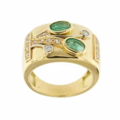 Bague bandeau émeraudes et diamants