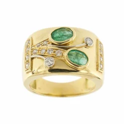 Bague bandeau émeraudes et diamants