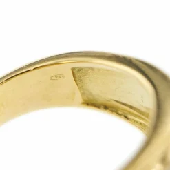 Bague bandeau émeraudes et diamants