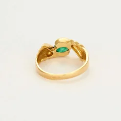 Bague bandeau or jaune, émeraude