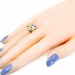 Bague bicolore diamants émeraude saphirs