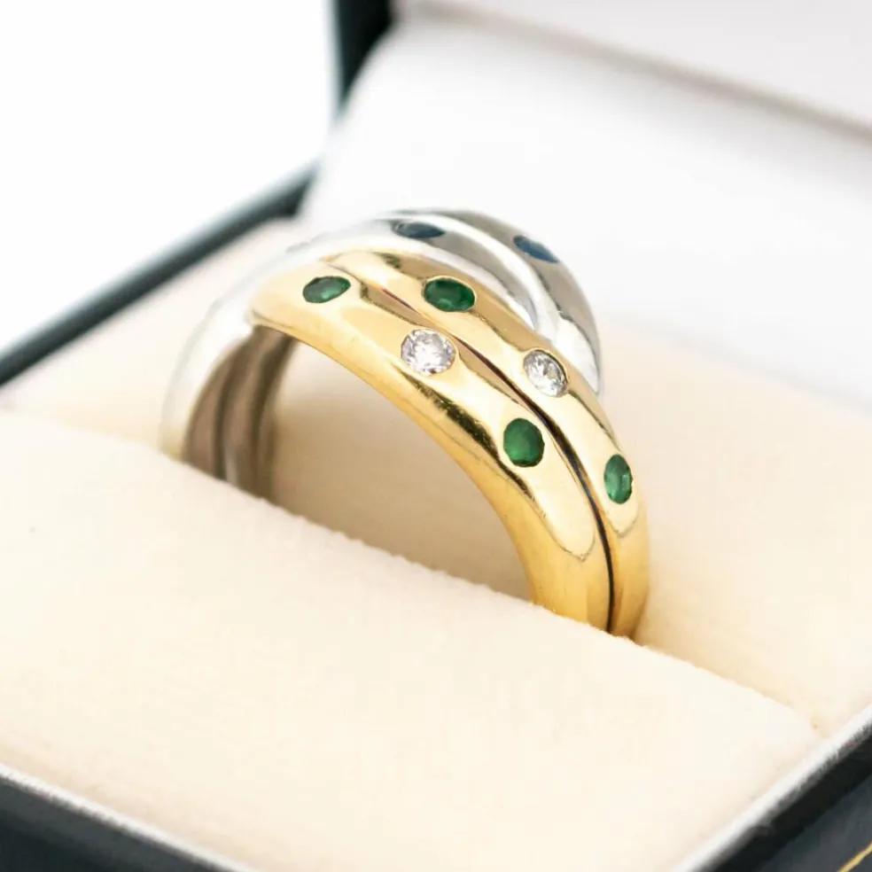 Bague bicolore diamants émeraude saphirs