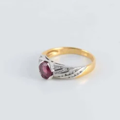 Bague bicolore Rubis et pavage Diamants