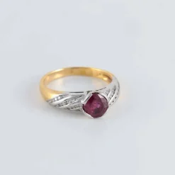 Bague bicolore Rubis et pavage Diamants