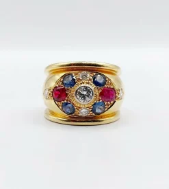Bague bombée 1960 or, diamant saphirs, rubis