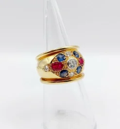 Bague bombée 1960 or, diamant saphirs, rubis