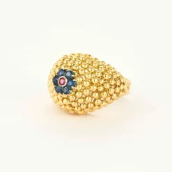 Bague boule vintage en or jaune 18K sertie de 6 saphirs et d'un rubis