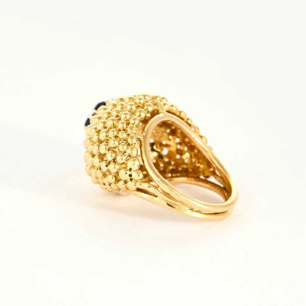 Bague boule vintage en or jaune 18K sertie de 6 saphirs et d'un rubis