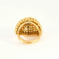 Bague boule vintage en or jaune 18K sertie de 6 saphirs et d'un rubis