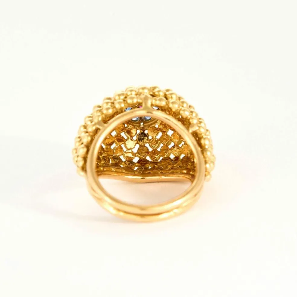 Bague boule vintage en or jaune 18K sertie de 6 saphirs et d'un rubis
