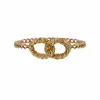 Bague chaine or jaune boucles entrelacées