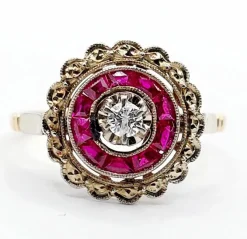 Bague cible Art Déco or rose, diamant, rubis calibrés (circa 1920)
