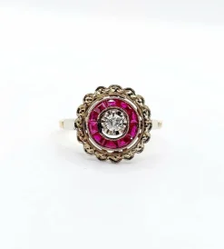 Bague cible Art Déco or rose, diamant, rubis calibrés (circa 1920)