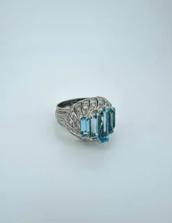 Bague cocktail or blanc et aigue-marines
