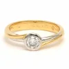 Bague contemporaine en or jaune et blanc 18 carats sertie d'un diamant (0.33ct)