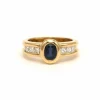 Bague contemporaine en or jaune 18 carats sertie d'un saphir et de diamants