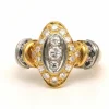 Bague contemporaine en or jaune et blanc 18 carats sertie d'un diamant (0.33ct)