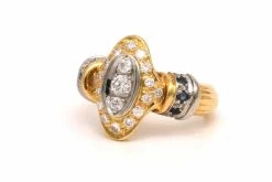 Bague contemporaine en or jaune et blanc 18 carats sertie d'un diamant (0.33ct)