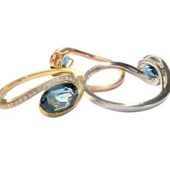 Bague contemporaine en or (jaune/blanc/rouge) avec diamants et topaze - 3 pièces