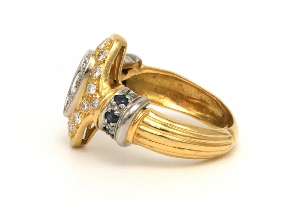 Bague contemporaine en or jaune et blanc 18 carats sertie d'un diamant (0.33ct)