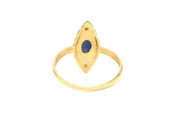 Bague contemporaine en or jaune 18 carats sertie d'un saphir et de diamants